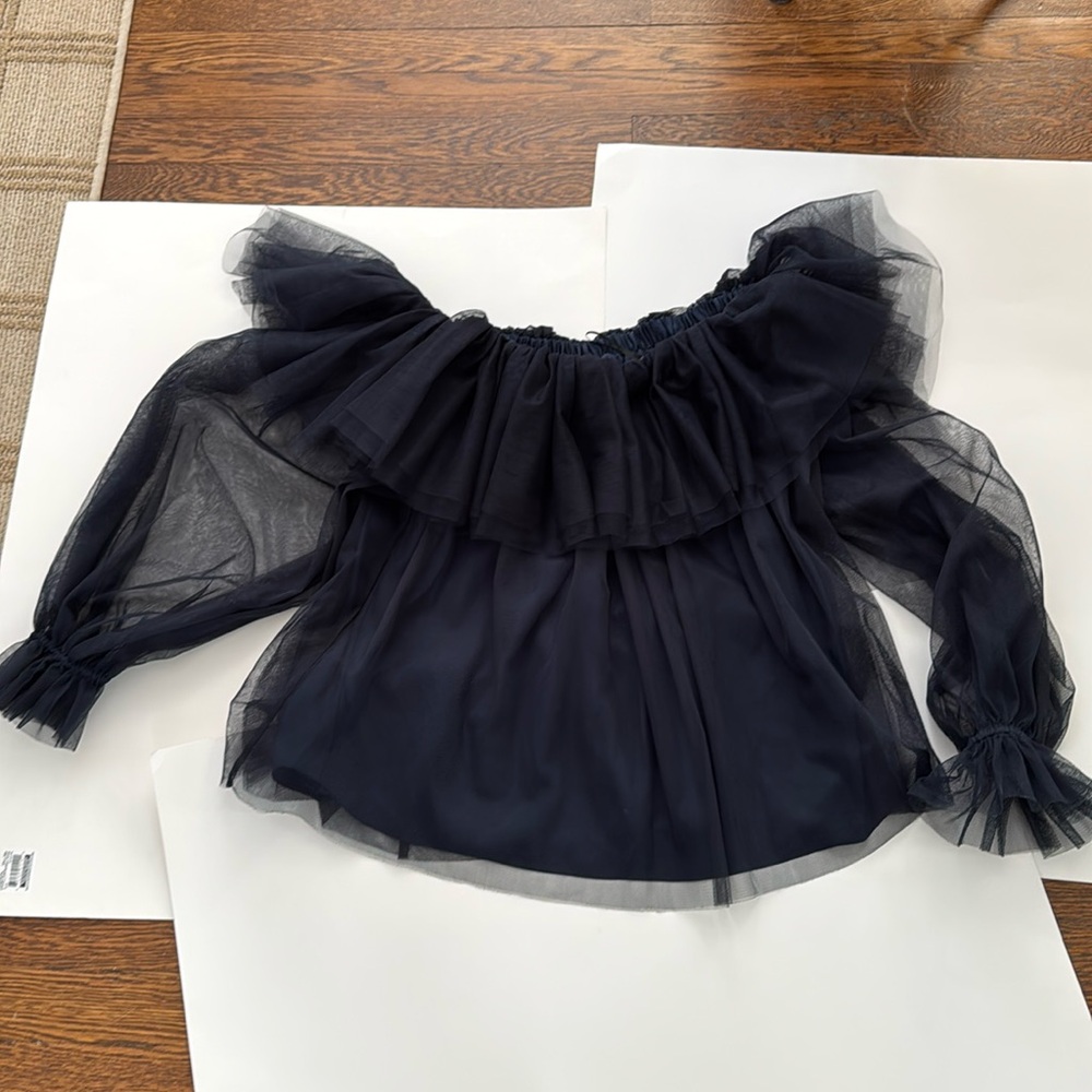 Long sleeve Trina Turk pull over top. Size Small